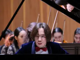 Рахат-Би Абдысагин вошёл в историю, представив первую квантовую симфонию в Оксфорде Рахат-Би Абдысагин